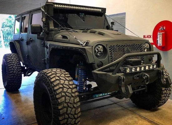 Matte Black Jeep Wrangler with custom bumper