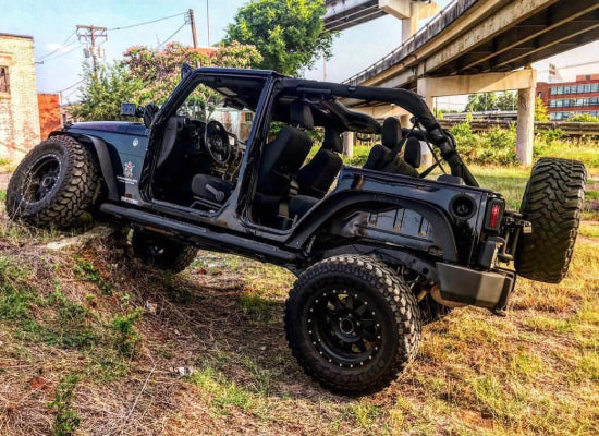 Black Jeep Wrangler with open top