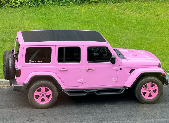 Pink Jeep Wrangler with pink tire rim
