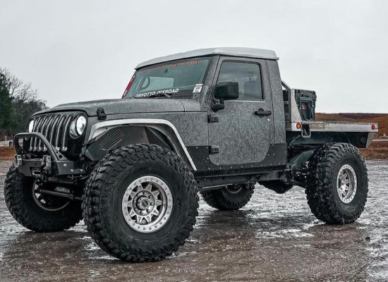 Gray Jeep Wrangler cut in half