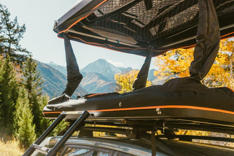 Overland Junction Golden Roof Top Tent on an suv