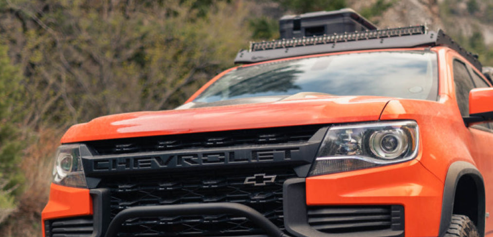 Prinsu Chevy Colorado Roof Rack Mounted on a red chevy