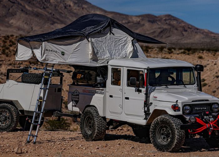 Toyota Truck with a white roof top tent