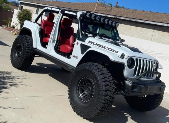 White Jeep Wrangler with red interiors