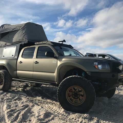 Prinsu roof rack on Tacoma with in-bed camper