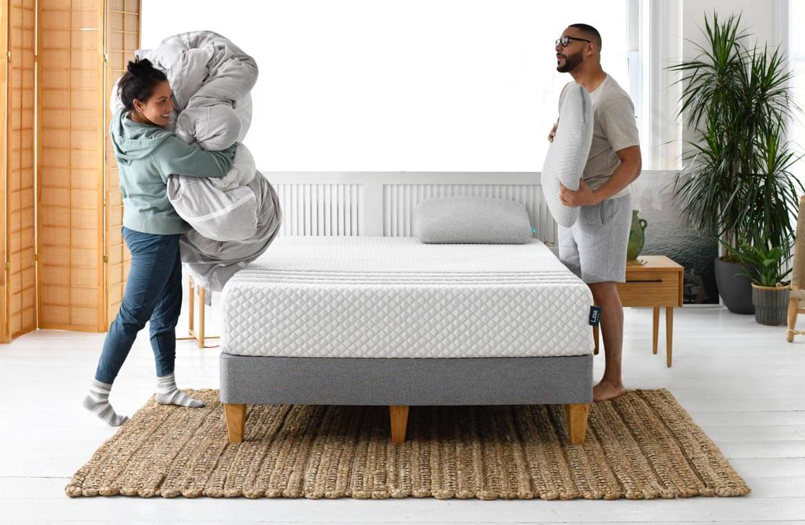 Couple making a Leesa Mattress