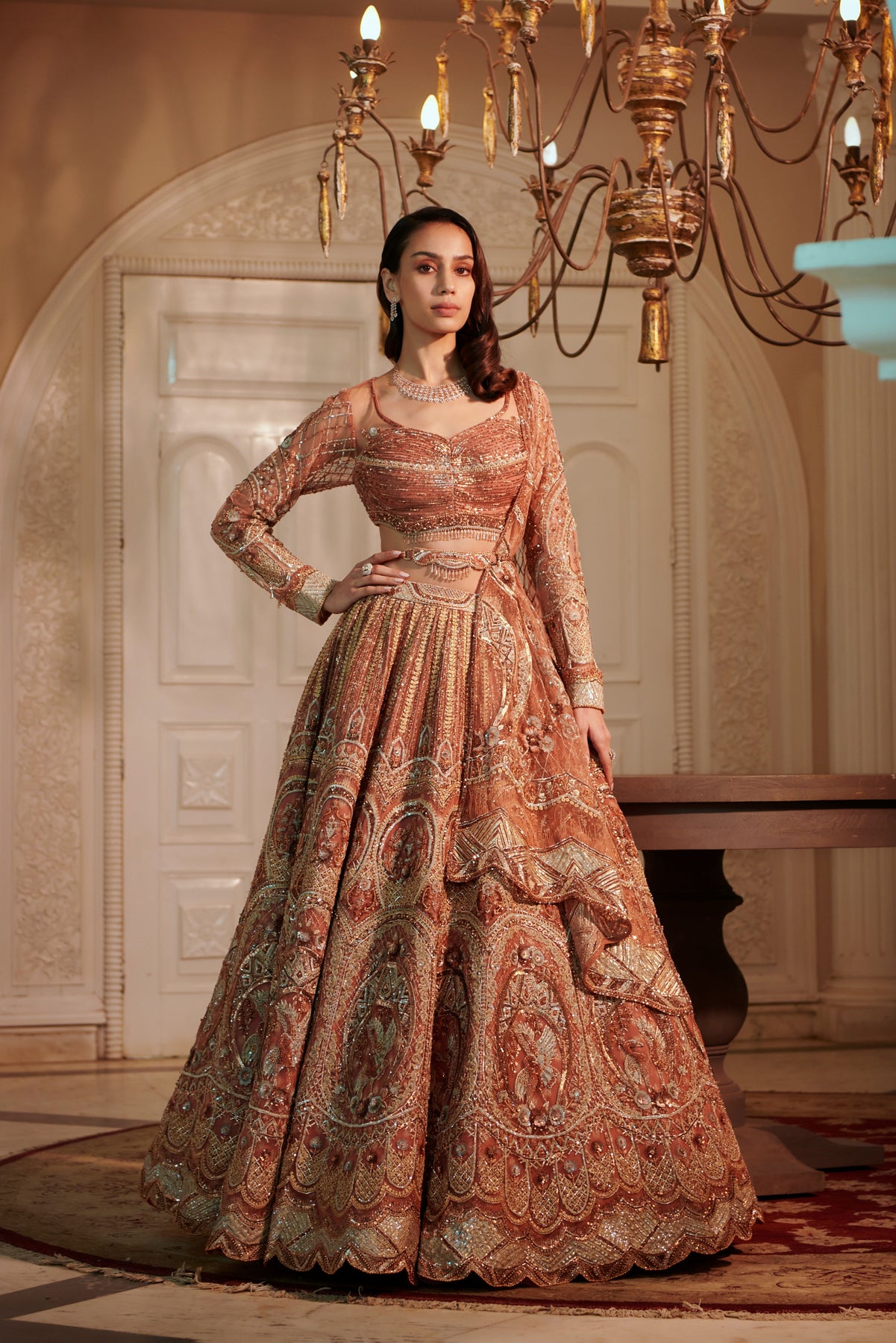 Wine suede couture lehenga with feather swans – Ricco India