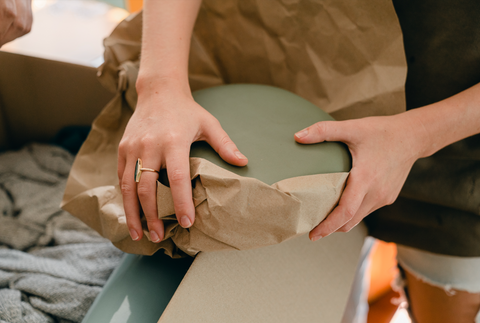 Wrapping presents with paper bags alternative to wrapping paper.