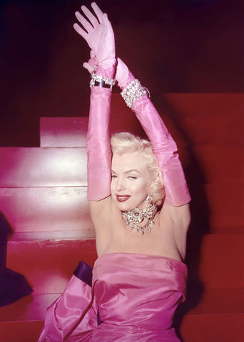Marilyn Monroe in Gentlemen Prefer Blondes (1953) One of Marilyn Monroe's most famous looks (of many) was in Gentlemen Prefer Blondes. During her rendition of "Diamonds Are a Girl's Best Friend," the actress—dripping in diamonds, of course—rocked a hot-pink strapless evening gown with matching gloves.