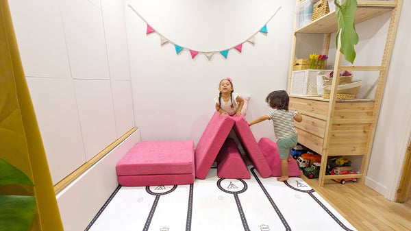 kids playing on a play couch