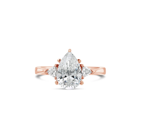 PEAR CUT DIAMOND ENGAGEMENT RING WITH TRILLION SIDE DIAMONDS