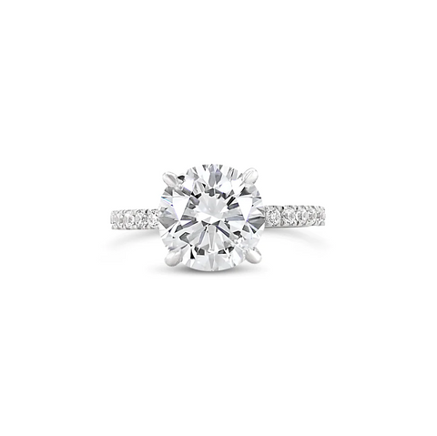 FOUR PRONG PAVÉ SETTING ENGAGEMENT RING