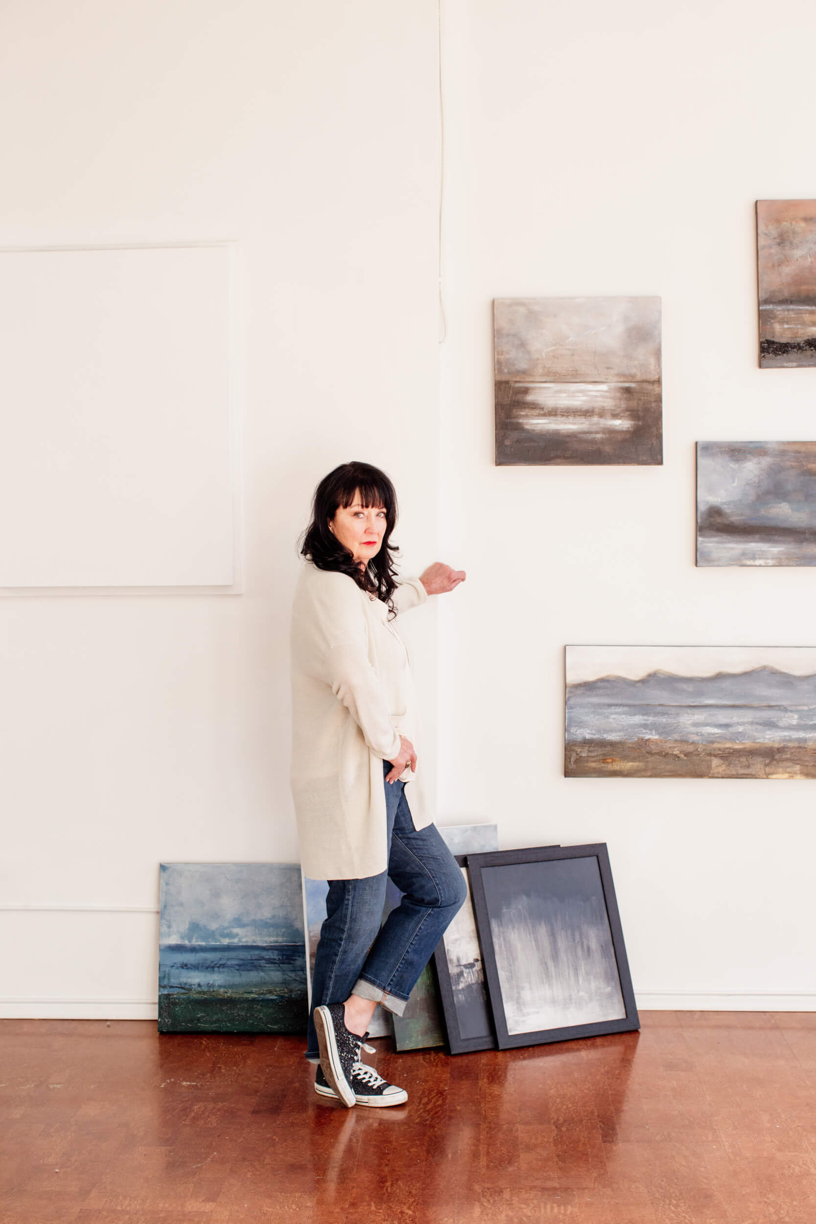 Artist Donna Anderson surrounded by her art