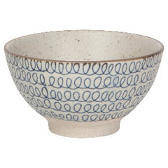 Cream bowl with blue scribble pattern