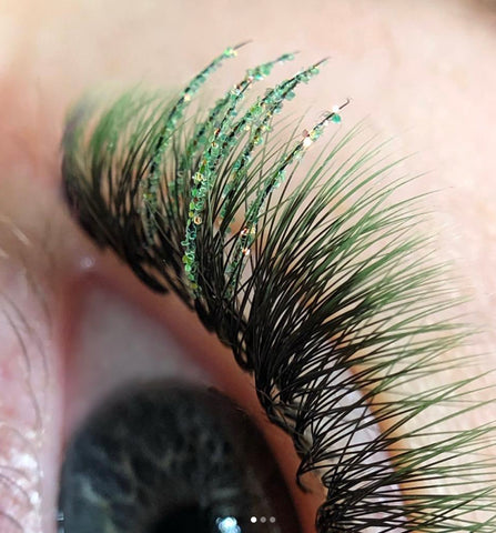 Green glitter eyelash extensions