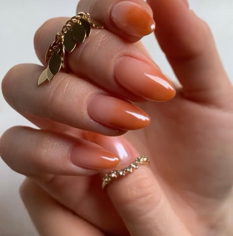 Peach ombre nails