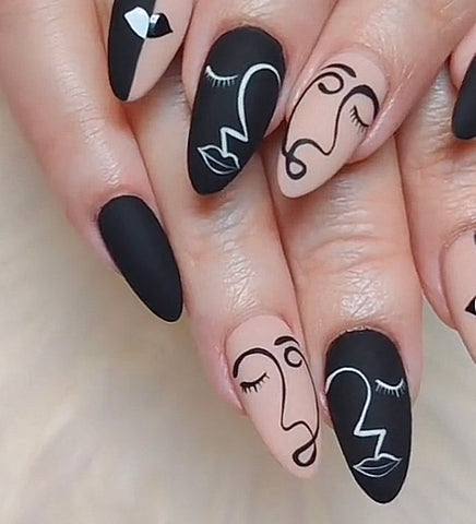Abstract nails with face silhouette nail art