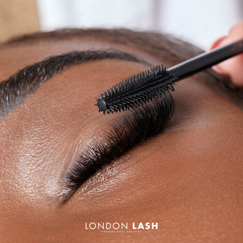 Brushing lash extensions with a silicone mascara brush