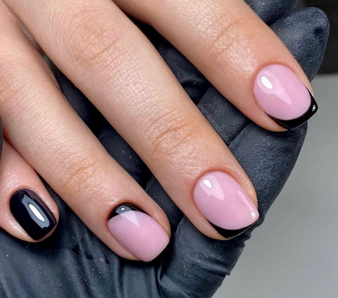 An image of abstract french nails with black nail polish