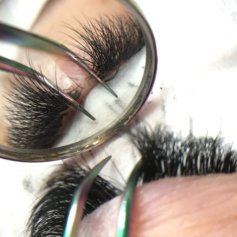 isolating the lashes during a lash fill