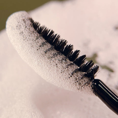 eyelash shampoo on a mascara brush