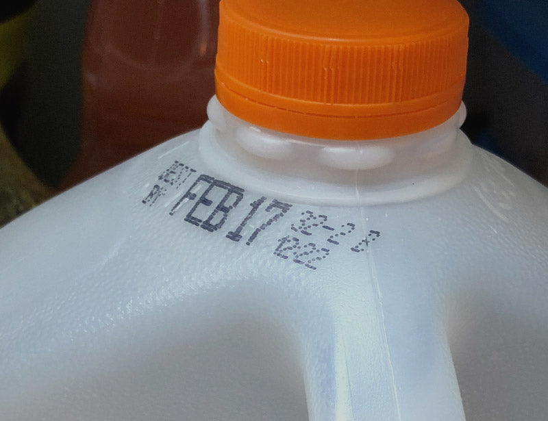 Plastic bottle showing expiration date