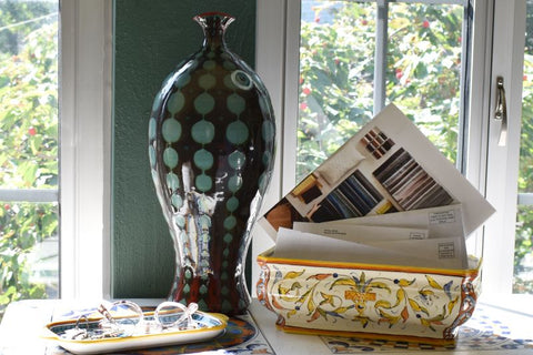 italian ceramic vase and tray in entryway foyer