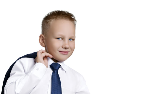 Image featuring a young boy's tuxedo inner shirt, a stylish choice for formal events, embodying elegance in boys' attire