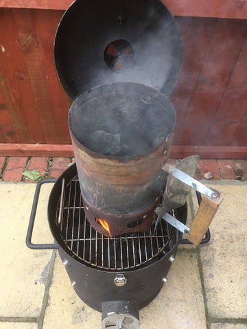 Lighting a chimney starter of charcoal