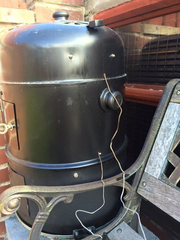 Holes drilled in my el cheapo budget smoker for temp probes