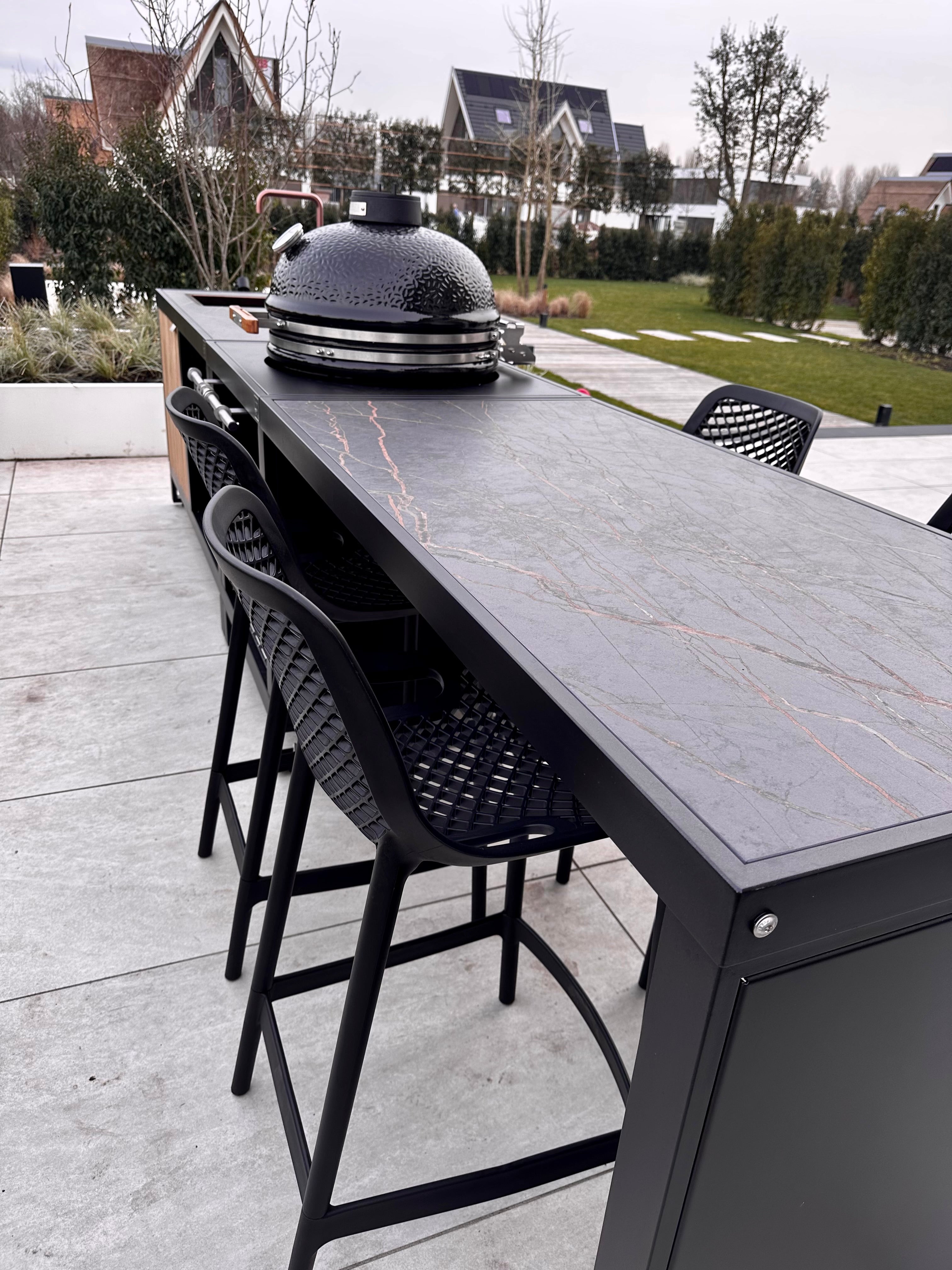 Roostr outdoor kitchen with bar and kamado