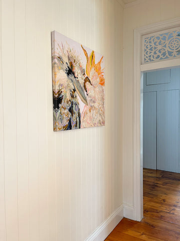 Square cockatoo and kookaburra art print on wall