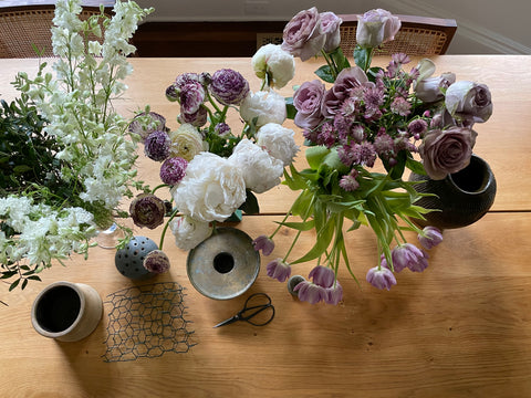 Getting tools and flowers ready to arrange