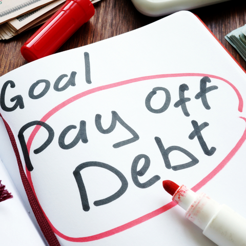 pay off debt written in black ink circled in red pen