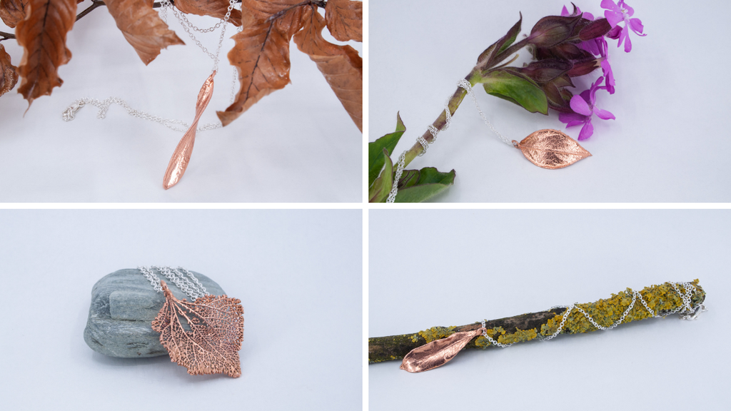 A selection of my recently made necklaces: seeds and leaves encased in copper displayed on twigs, branches and flowers