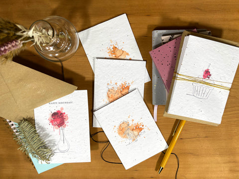 An image of colourful seed cards, made from recycled post consumer waste.