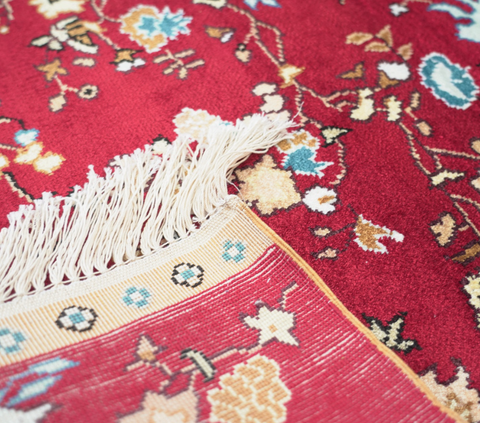 Persian red silk carpet