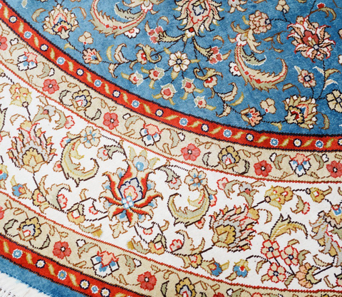 round silk Persian rug