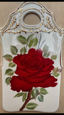 bread board with red rose