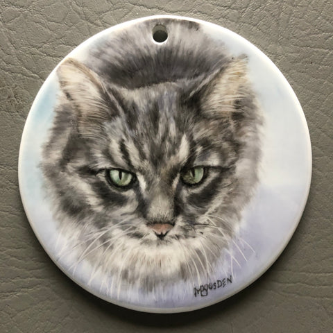 round ornament with cat