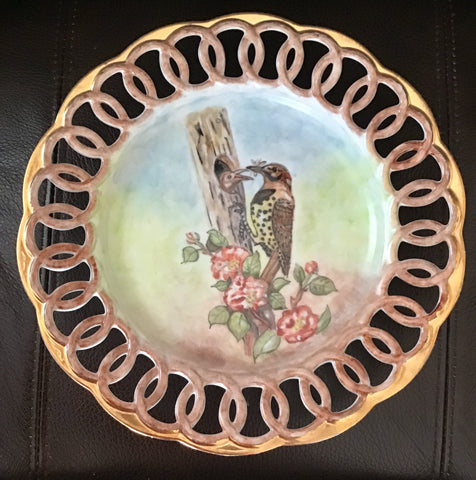 bird on openwork plate