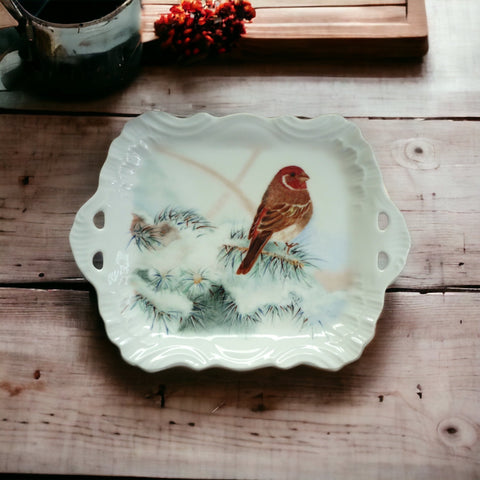 small tray with openwork handles and bird