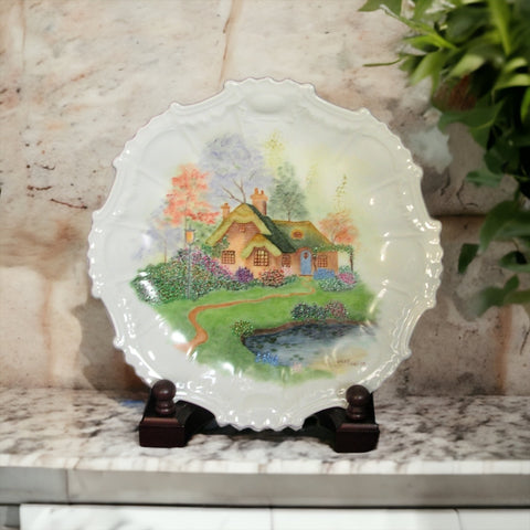 A porcelain remembrance of a cozy country cottage on plate