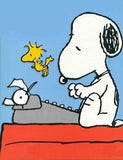 Snoopy typing his thoughts on his typewriter
