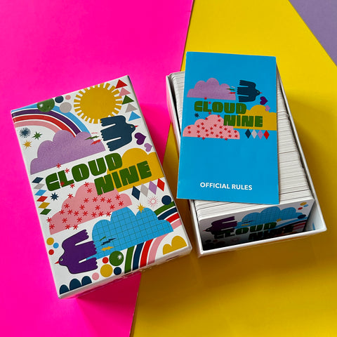 brightly colored open card game box