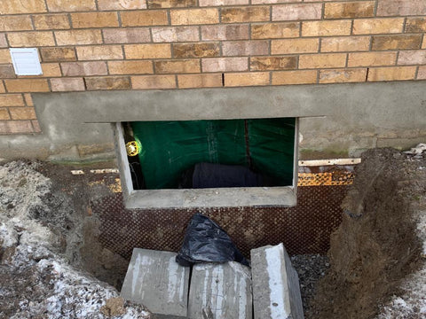 Concrete Cut for an egress window installation