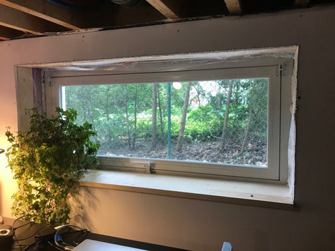 A photo of a recently installed egress window.