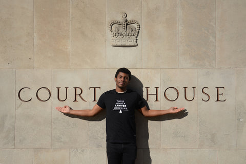 Lady Justice Apparel™ male model wearing unisex design What A Lawyer Looks Like at the Toronto Superior Court of Justice Ontario