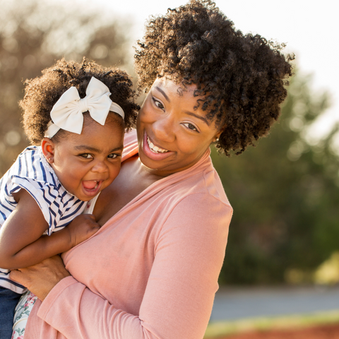 Mom and Baby showing off their perfectly coiled hair