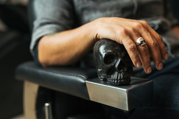 man wearing skull